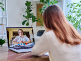 Teenaged girl watching video of her doctor