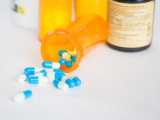Spilled medication bottle
