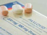 Paxlovid tablets on box