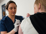 Woman being immunized