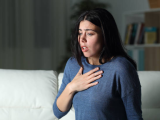 Woman having asthma attack