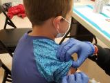 boy getting vaccinated 
