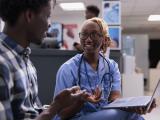Nurse talking with patient in emergency department