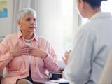 elderly woman with doctor