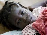 Girl receiving cholera treatment