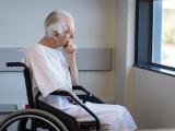 Elderly man in wheelchair