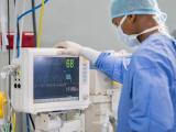 Healthcare worker with gloves and mask