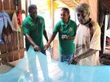 Placing a malaria-preventing bed net