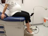 Pregnant woman in exam room