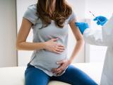 Pregnant woman receiving vaccine