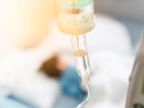 Sick child hooked up to IV fluids
