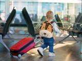 Small child walking in airport