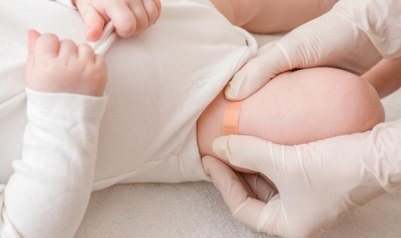 Band aid after baby vaccination