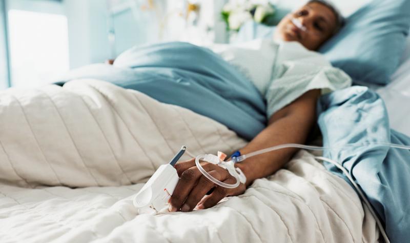 Woman in hospital bed