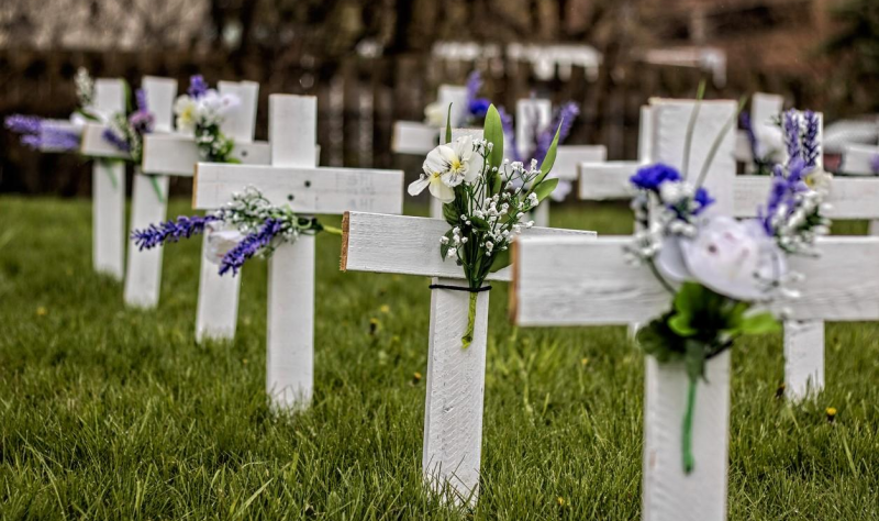 Grave markers with flowers