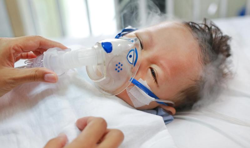 Baby getting nebulizer treatment
