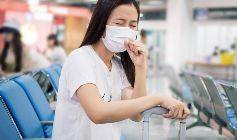 Sick female airplane passenger