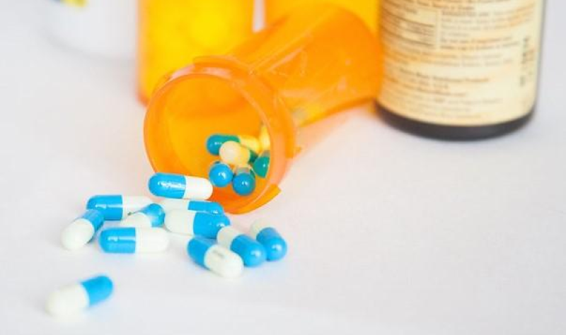 Spilled medication bottle