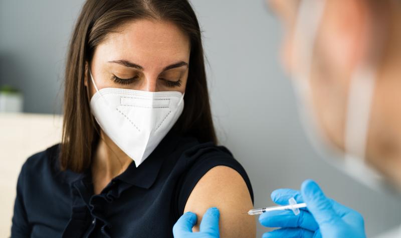 Woman getting vaccinated
