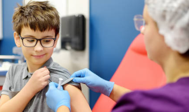 Young boy getting vaccinated