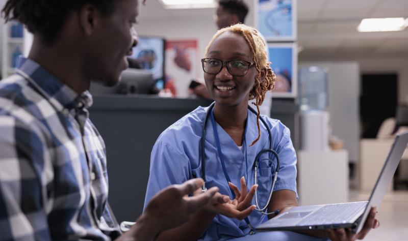 Nurse talking with patient in emergency department