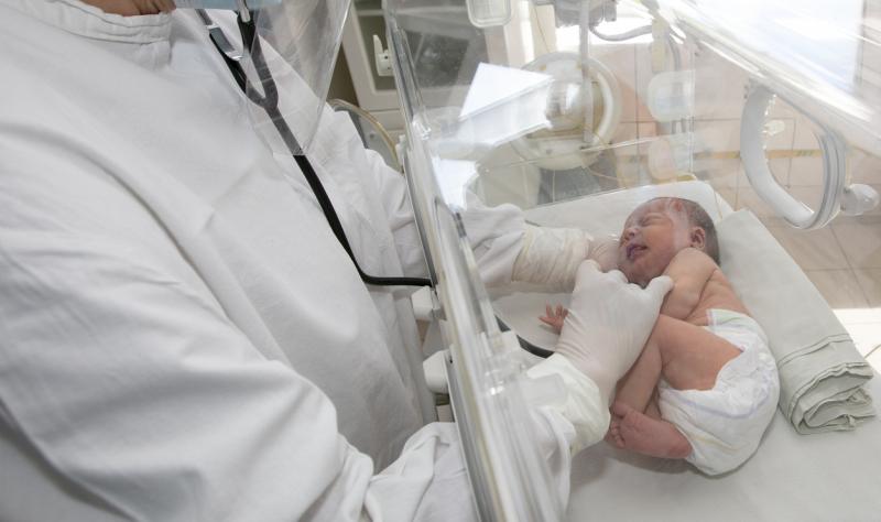 newborn and doctor