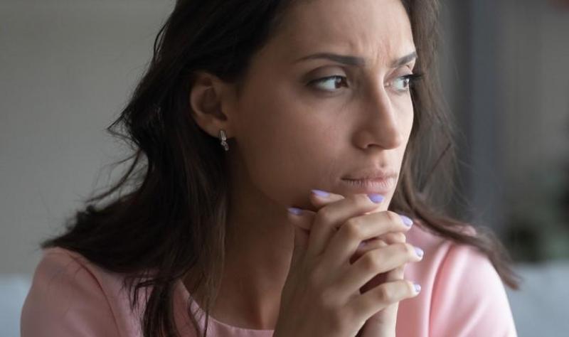 Anxious-appearing woman