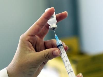 HPV vaccine syringe and vial