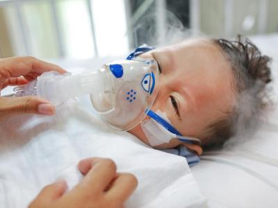 Baby getting nebulizer treatment