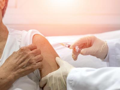 Older woman getting vaccinated