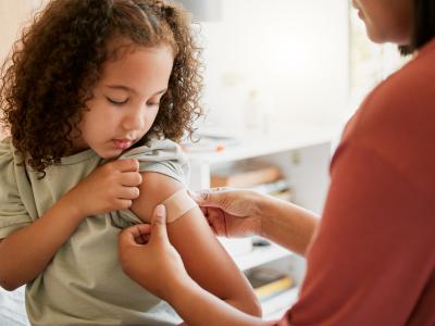 Child receiving vaccine