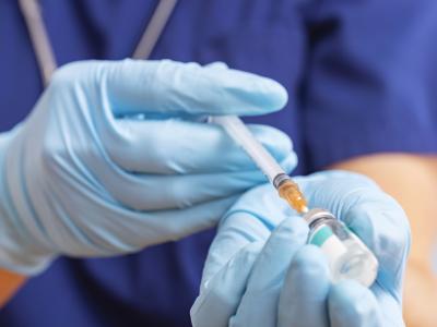 Nurse preparing vaccine