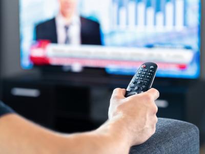 man watching news