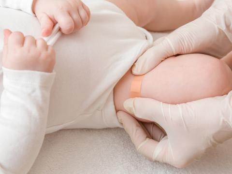 Band aid after baby vaccination