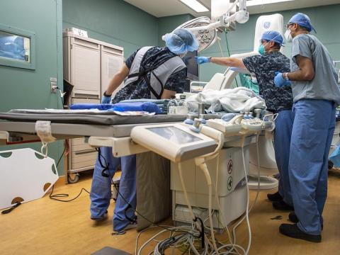 US Navy surgeons in operating room