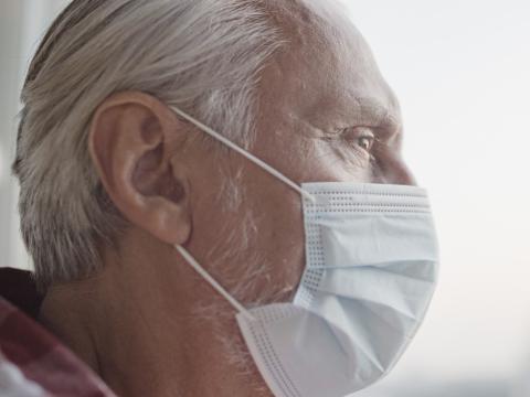 Older man wearing face mask