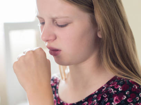 Girl coughing