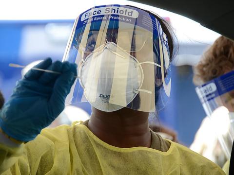 Health worker in respirator