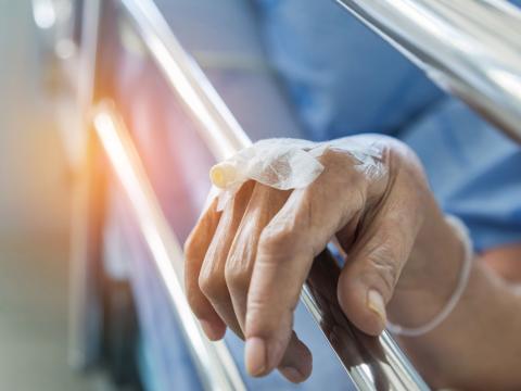 Hand of elderly man in hospital