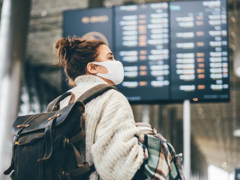 Masked air traveler
