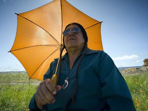 New Mexico native man with umbrella