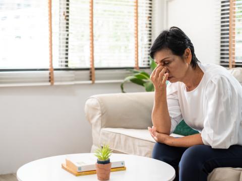 Exhausted middle-aged woman