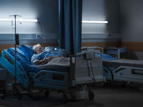 Older man in hospital bed
