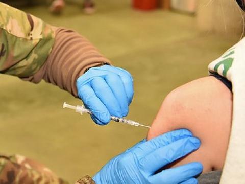 Older woman getting vaccinated