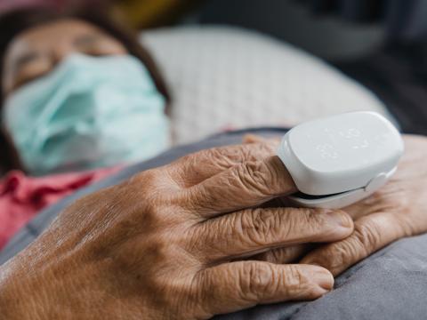 Pulse oximeter on hospital patient