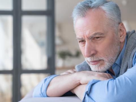 Sad worried old man