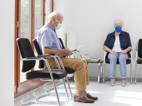 Seniors in quiet waiting room