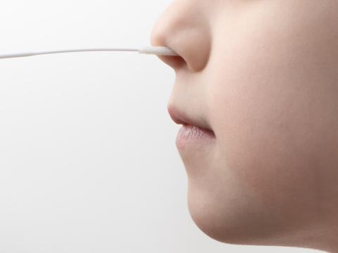 Swab going into child's nose