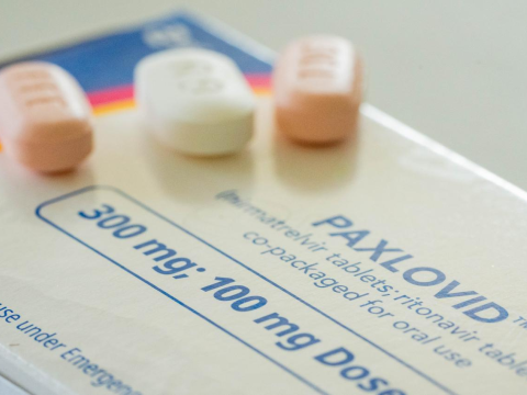 Paxlovid tablets on box