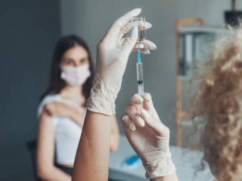 Vaccinating a woman